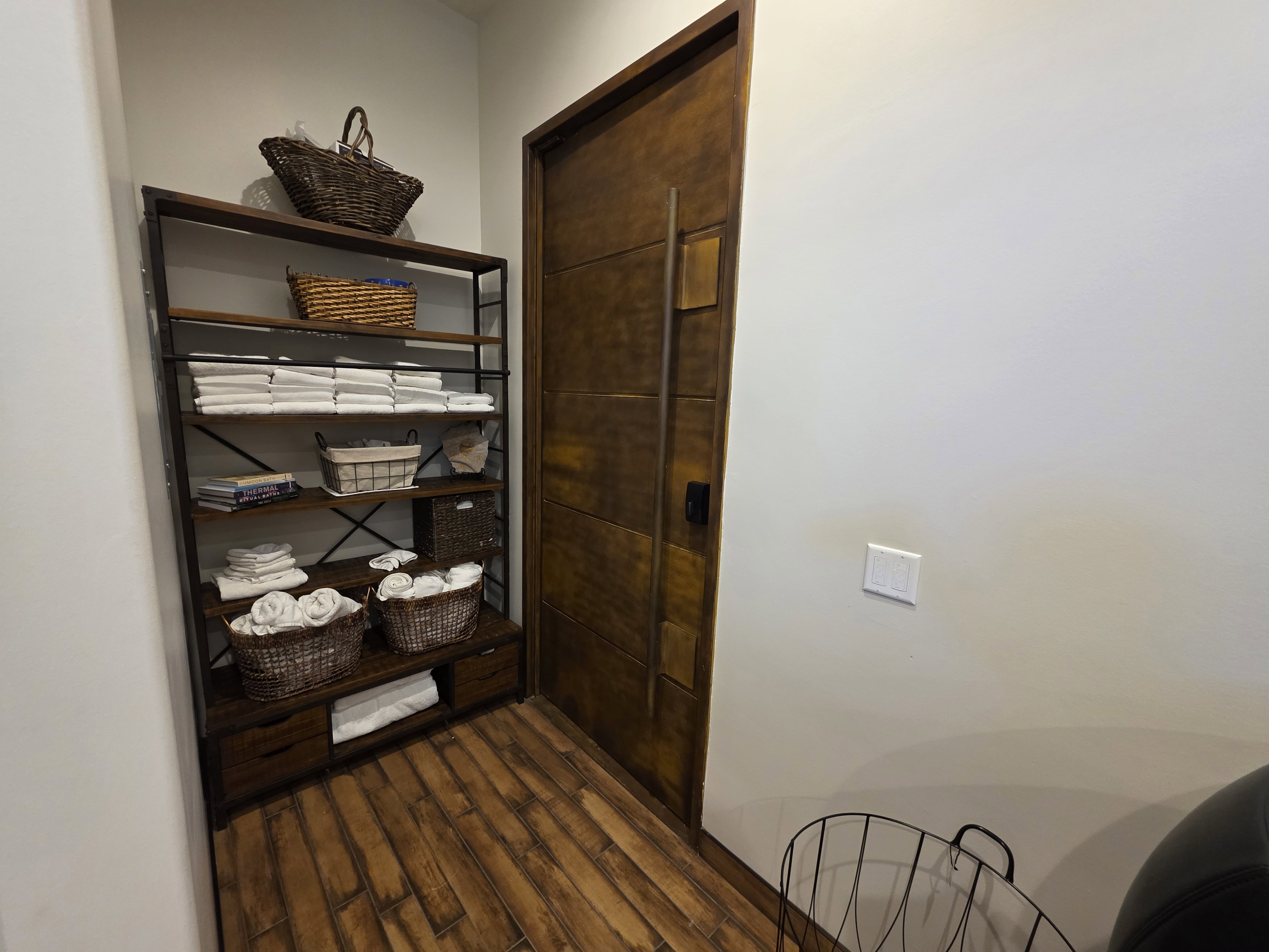 Corridor with dark wood-style floors