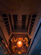 Sauna / steam room featuring wooden walls and wooden ceiling
