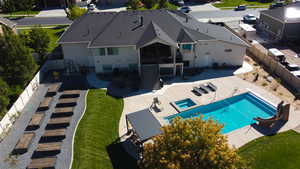 View from above of property featuring a pool area