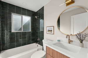 Full bath with  shower combination and vanity