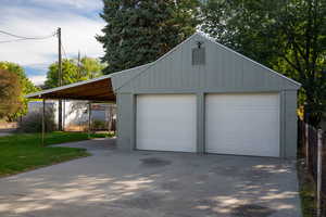 Garage featuring a detached garage