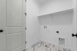 Washroom with washer hookup and hookup for an electric dryer