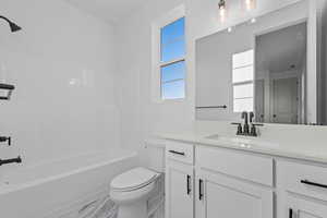 Full bathroom featuring vanity and shower / washtub combination