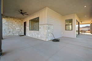 View of patio with a ceiling fan