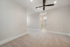 Unfurnished room with light carpet, ceiling fan, and recessed lighting