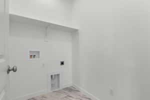 Laundry room featuring hookup for a washing machine and electric dryer hookup