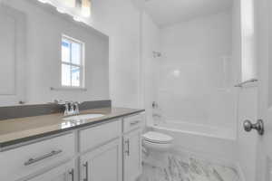 Bathroom with vanity and  shower combination