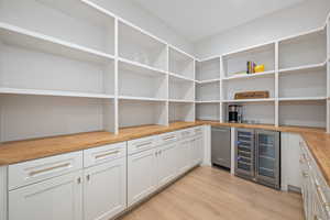 Storage area with beverage cooler