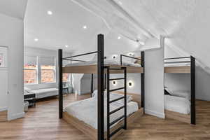 Bedroom featuring light wood-type flooring and recessed lighting