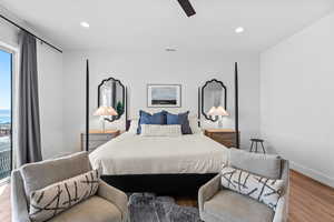 Bedroom featuring recessed lighting, wood finished floors, and a ceiling fan