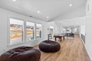 Rec room featuring recessed lighting, lofted ceiling, light wood-type flooring, and billiards