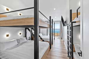 Bedroom featuring light wood finished floors and recessed lighting