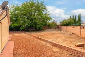View of fenced backyard