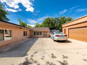 Single story home featuring stucco siding