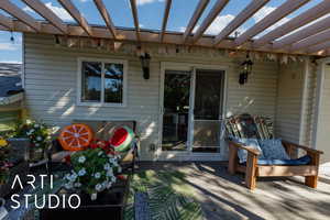 View of patio / terrace featuring a pergola and a wooden deck
