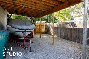 View of fenced backyard