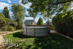 View of fenced backyard