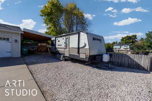 View of side of property featuring an outbuilding
