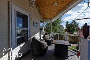 Deck featuring a fire pit