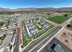View of property location featuring a mountainous background and nearby suburban area