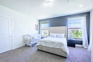 Bedroom with carpet and baseboards