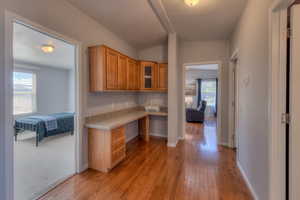 Upstairs hallway desk with view of bedroom and family room