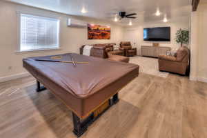 Downstairs pool table and living room