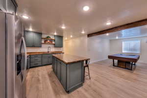 Downstairs kitchen + pool table