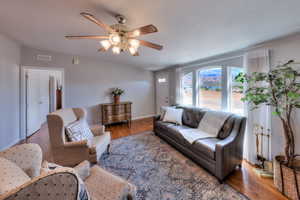 Upstairs living room with entrance to Primary Bedroom
