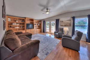 Upstairs family room with built-in cabinets