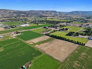 View of property location with a mountain backdrop, rural landscape, and abundant farmland