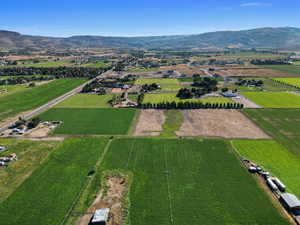 View of property location featuring a mountain backdrop and rural landscape