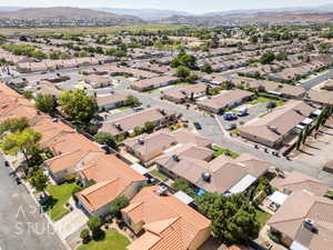 Aerial view of residential area featuring mountains