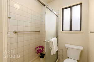 Full bathroom featuring toilet