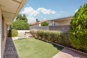 Fenced backyard featuring a patio area