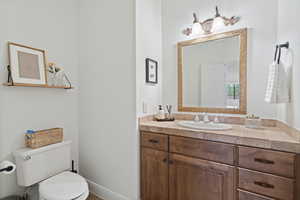Bathroom with vanity and tile patterned flooring