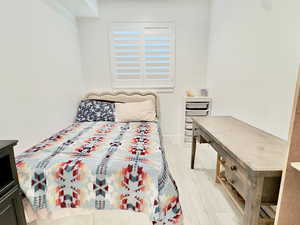 Bedroom featuring light wood-style floors