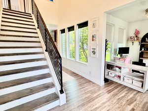 Stairway with wood finished floors