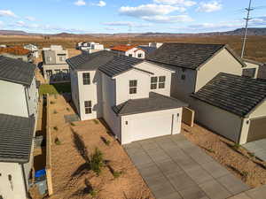 Aerial view of residential area with a mountain backdrop
