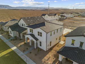 Aerial view of residential area with a mountainous background
