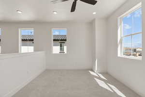 Spare room with carpet flooring, recessed lighting, and ceiling fan