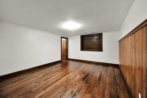 With walnut floors and walk - closet