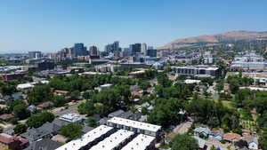 Aerial overview of property's location with skyline and mountains