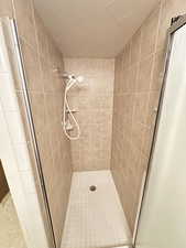 Bathroom featuring a stall shower