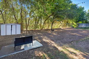 View of yard with a shed