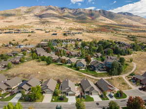View of property location with nearby suburban area and a mountainous background