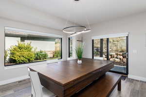 Dining room with light wood-style floors