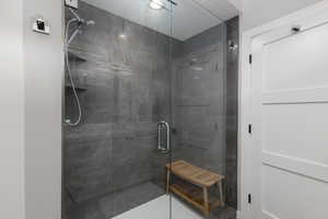Bathroom featuring a shower stall