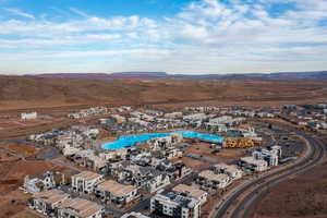 Bird's eye view of a mountain backdrop and a pool area