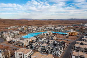 Bird's eye view of a pool area and a mountainous background